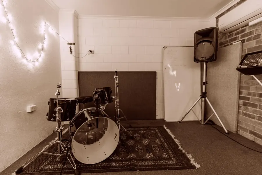 Rehearsal Room 1 at Thebarton: drum kit, PA and treated walls