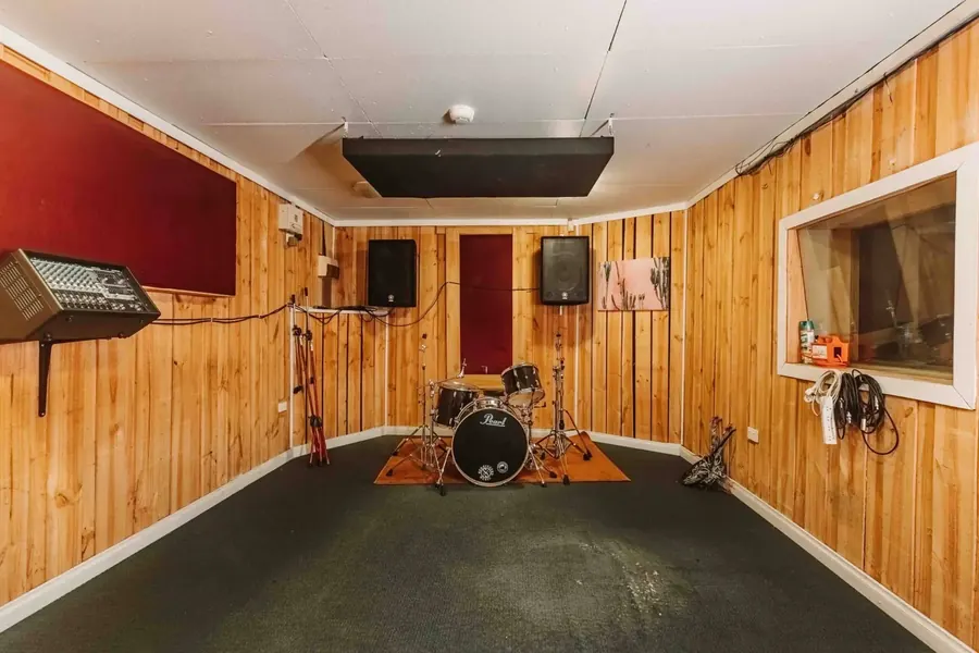 Rehearsal Room 4 at Thebarton: drum kit, PA and treated walls
